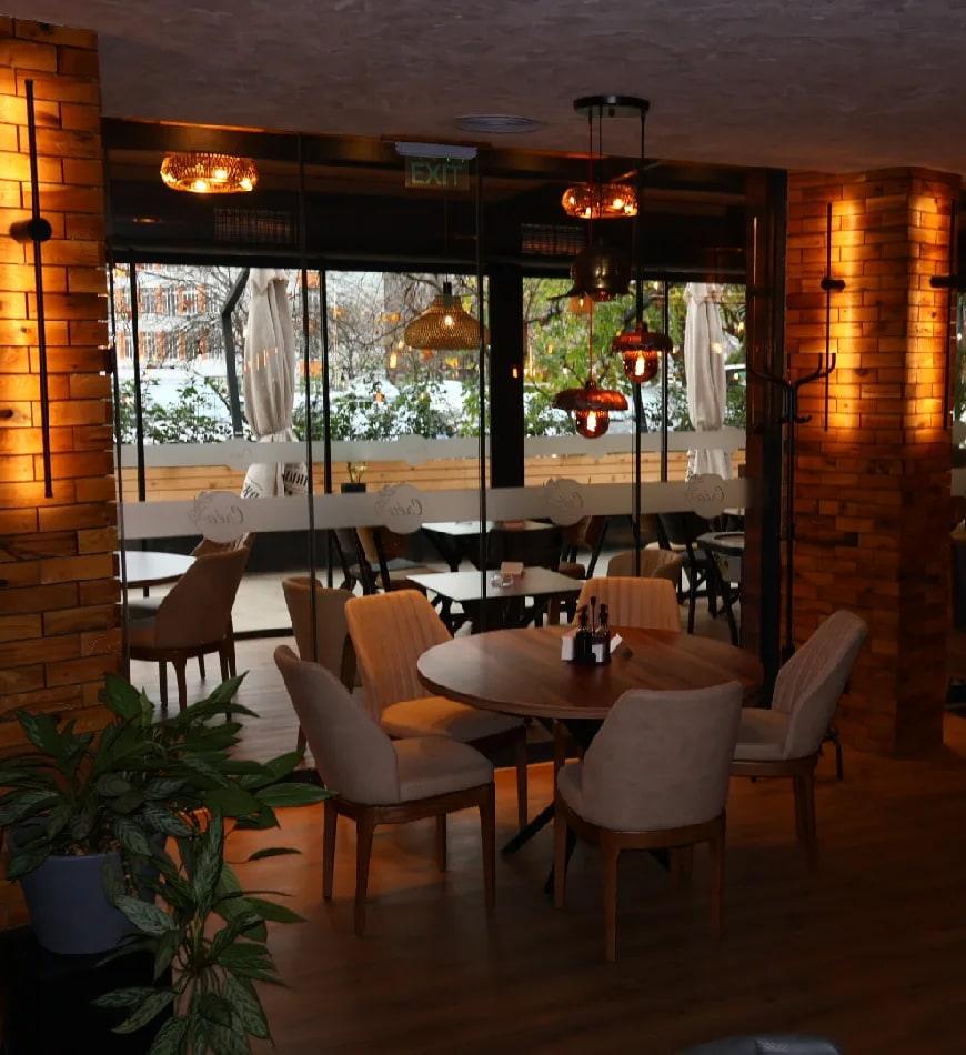 The dining room of Créa looking out to the garden