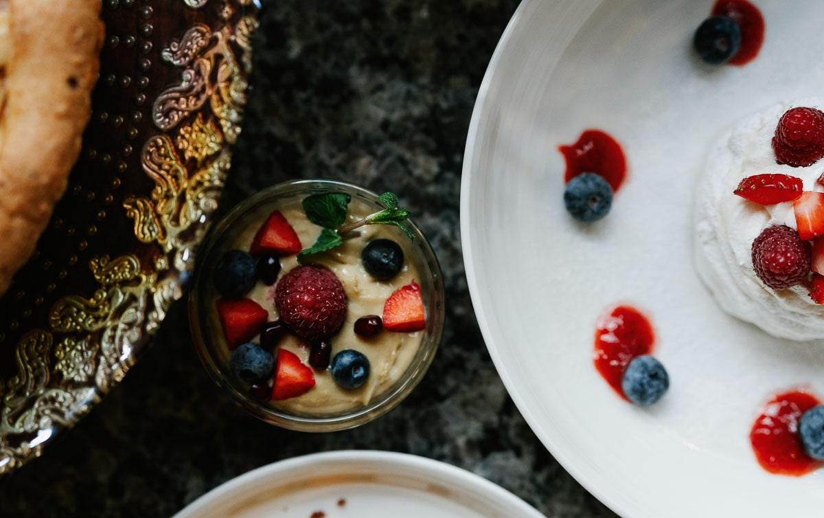 Cream with berries and a pavlova